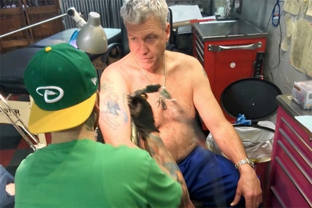 Better off just getting that tat removed, rather than changing it each time you get fired.